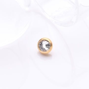 Detail View 1 of Implant Grade Titanium Golden Internally Threaded Bezel Set Round Gem Part-Clear Gem